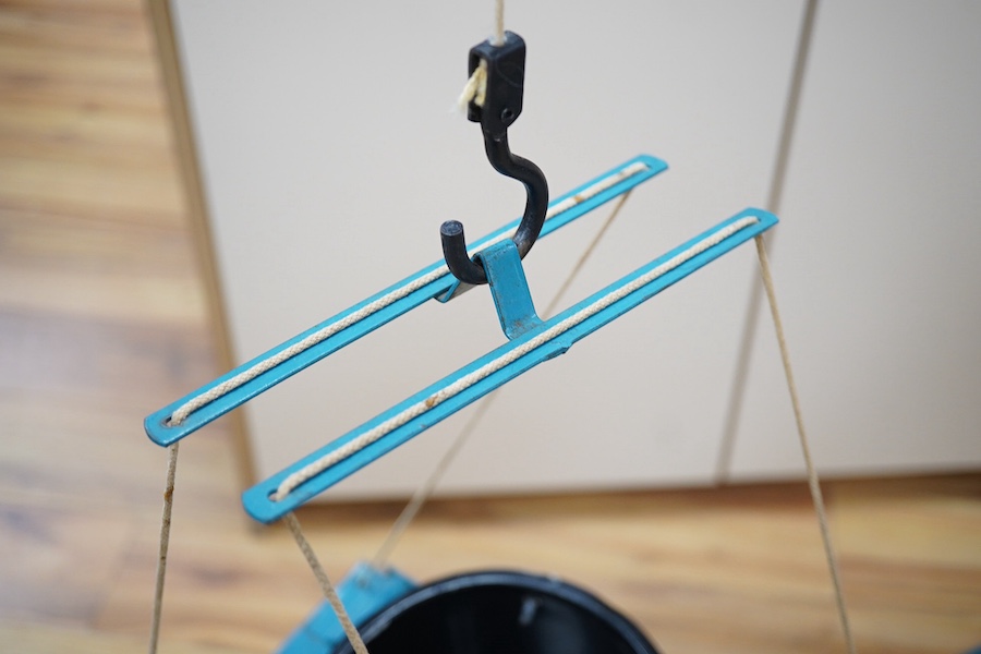 A 1950s Tri-ang large scale tinplate dockside crane with accessories including; a metal bucket, a plastic wrecking ball, etc. 88cm high to top of cab. Condition - fair to good, small patches of surface rust and some mino